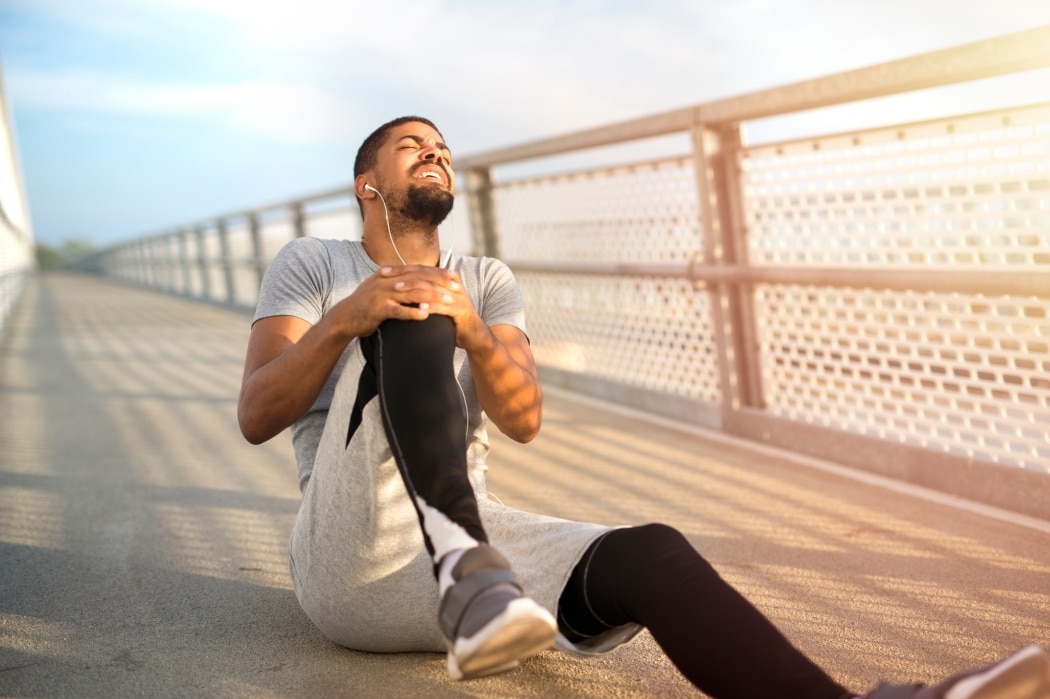 A jogger pulls up with knee and joint pain.